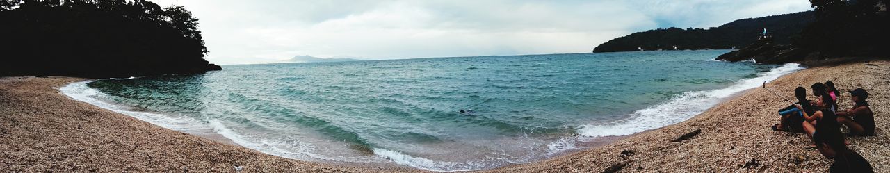 Panoramic view of beach against sky