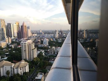 Modern buildings in city against sky