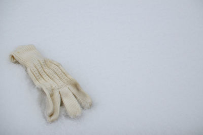 High angle view of snow on white background