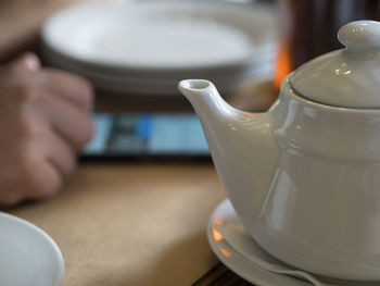 Close-up of teapot on table