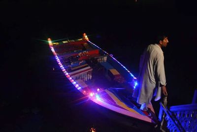 View of illuminated train at night