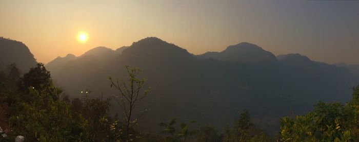 Scenic view of mountains at sunset