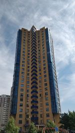 Low angle view of modern building against sky