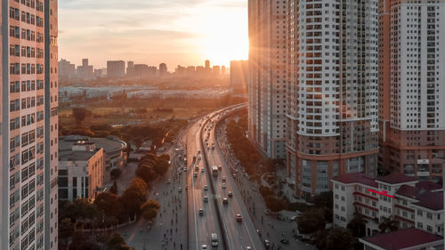 High angle view of street amidst buildings in city