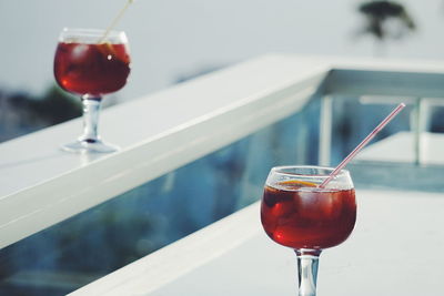 Close-up of wineglasses on table