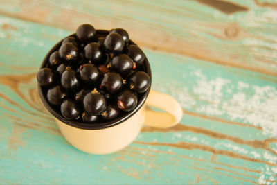 High angle view of black coffee in bowl on table