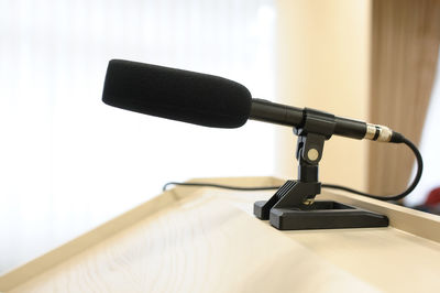 Close-up of camera on table