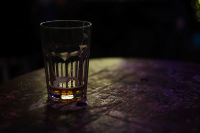 Close-up of beer glass on table