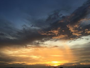 Low angle view of dramatic sky during sunset