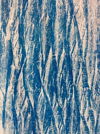 Full frame shot of icicles on land