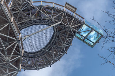 Low angle view of metallic structure against sky