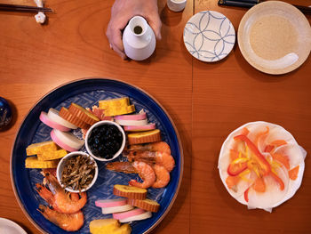 High angle view of fish served on table