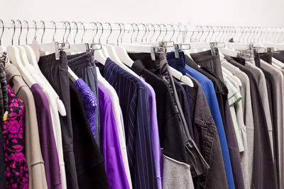 Panoramic view of clothes hanging in rack