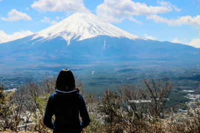 Rear view of woman looking at mount fuji