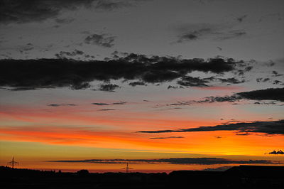 Scenic view of dramatic sky during sunset