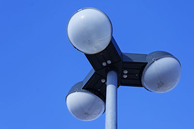 Low angle view of street light against clear sky