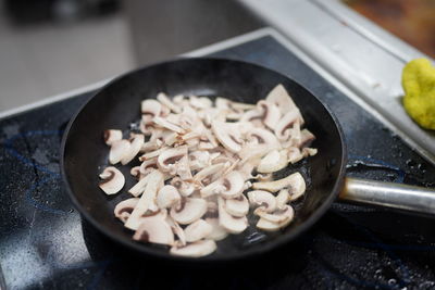 High angle view of meat in cooking pan