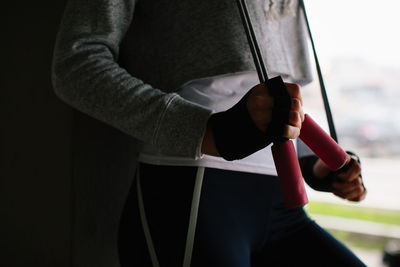 Close-up of person holding umbrella