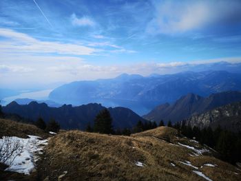 Scenic view of snowcapped mountains against sky