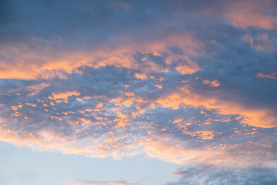 Low angle view of clouds in sky during sunset