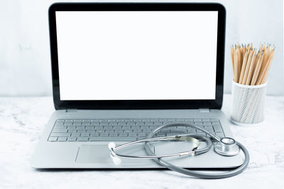 Close-up of laptop on table