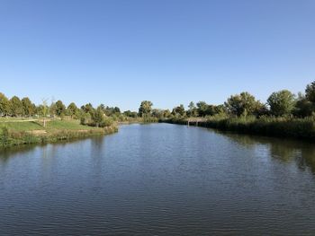 Scenic view of lake against clear sky