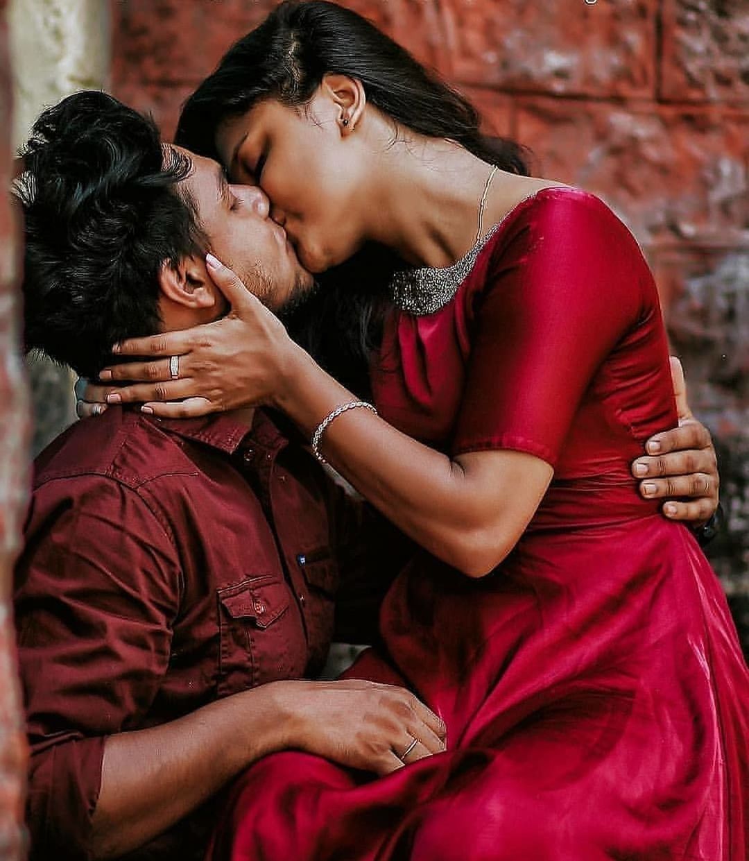 women, adult, love, emotion, two people, togetherness, positive emotion, romance, embracing, female, red, men, kissing, young adult, affectionate, person, ceremony, happiness, smiling, bonding, clothing, passion, photo shoot, eyes closed, brick, sitting, portrait, child, lifestyles