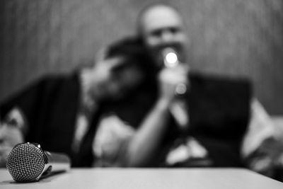 Cropped image of woman holding light