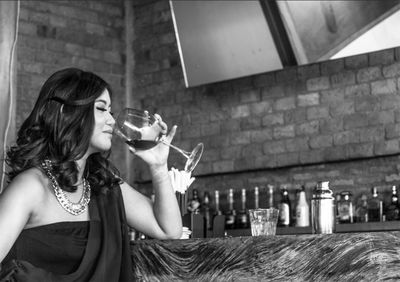 Beautiful woman drinking glass of wine