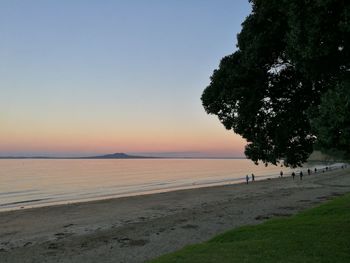 Scenic view of calm sea at sunset