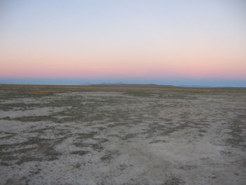 Scenic view of landscape at sunset