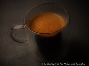 High angle view of coffee cup on table