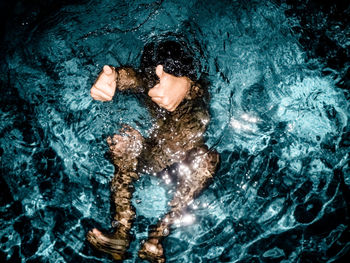 High angle view of person swimming in pool