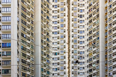 Close-up to a densely populated apartment buidling in hong kong, china