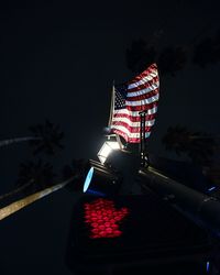 Low angle view of illuminated lights