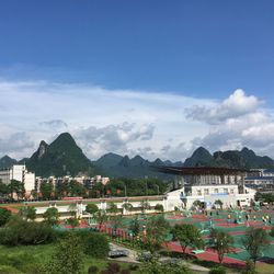 Scenic view of mountains against cloudy sky