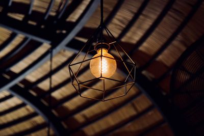 Low angle view of illuminated pendant light