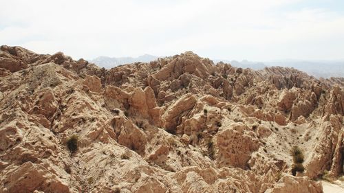 Scenic view of rocky mountains against sky