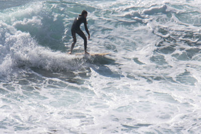 Man surfing in sea