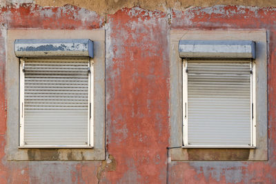 Closed window of old building