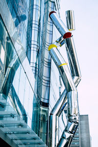 Low angle view of modern building against clear sky