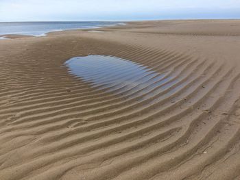 Scenic view of sandy beach