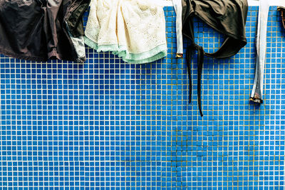 High angle view of clothes hanging on floor