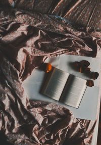 High angle view of open book on table