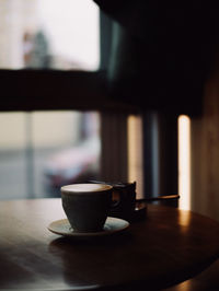 Coffee cup on table