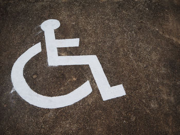 High angle view of wheelchair sign