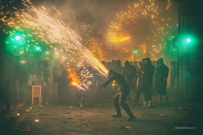 Firework display at night