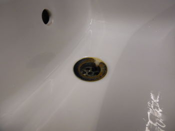 High angle view of faucet in bathroom