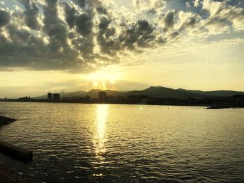 Scenic view of silhouette mountains against sky during sunset