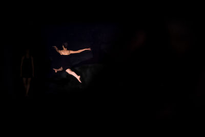 Group of people in the dark